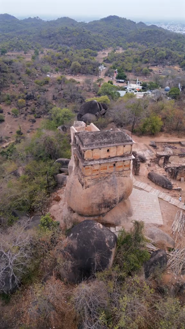 Vertical Aerial View of Historic Hilltop Ruins Overlooking Jabalpur, India