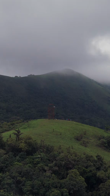 Vertical Aerial View of Hosahalli Gudda and Misty Western Ghats Sakleshpur Karnataka