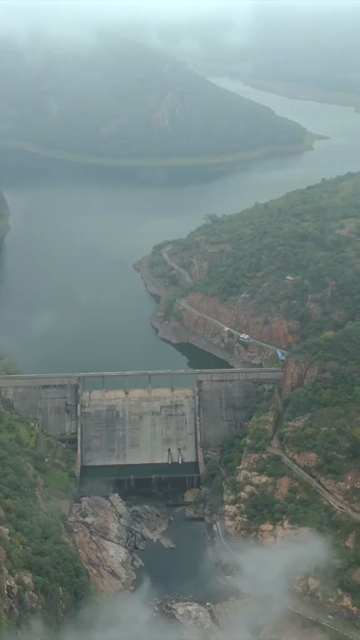 Vertical Aerial View of Jakham Dam and Misty Forested Hills Pratapgarh Rajasthan India