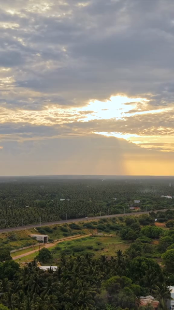 Vertical Aerial View of Kanyakumari Landscape with Railway Track at Sunset Tamil Nadu