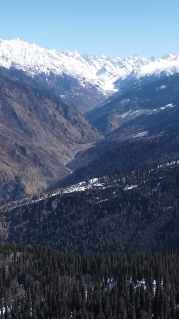 Vertical Aerial View of Kedarkantha Trek Snow Camp and Himalayan Mountains Uttarakhand