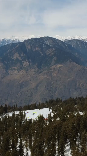 Vertical Aerial View of Kedarkantha Trek Snow Camp and Himalayan Mountains Uttarakhand