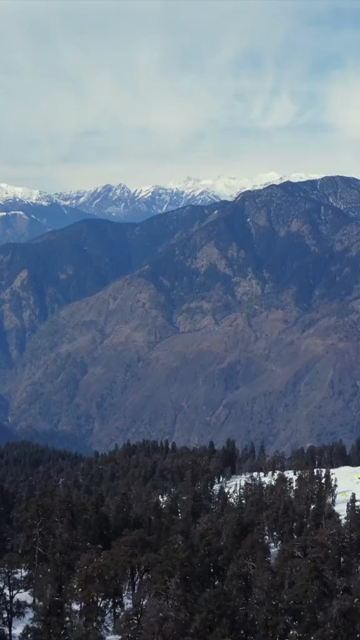 Vertical Aerial View of Kedarkantha Trek Snow Camp and Himalayan Mountains Uttarakhand
