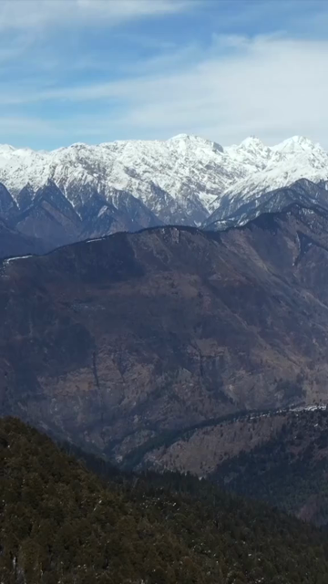 Vertical Aerial View of Kedarkantha Trek Snow Camp and Himalayan Mountains Uttarakhand