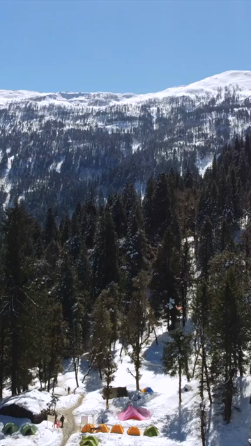 Vertical Aerial View of Kedarkantha Trek Snow Camp and Himalayan Mountains Uttarakhand