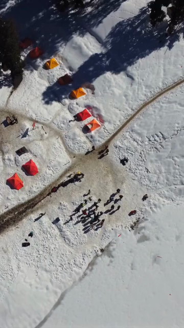 Vertical Aerial View of Kedarkantha Trek Snow Camp and Himalayan Mountains Uttarakhand