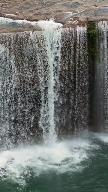 Vertical Aerial View of Krang Suri Falls and Lush Forest Landscape Meghalaya