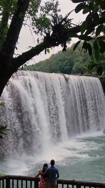 Vertical Aerial View of Krang Suri Falls and Lush Forest Landscape Meghalaya