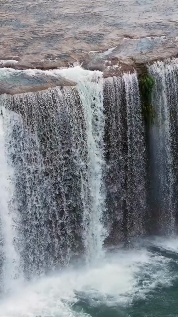 Vertical Aerial View of Krang Suri Falls and Lush Forest Landscape Meghalaya