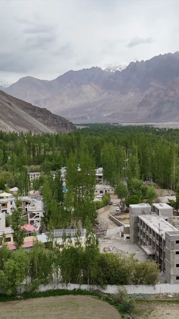 Vertical Aerial View of Leh City Surrounded by Himalayan Mountains in Ladakh India