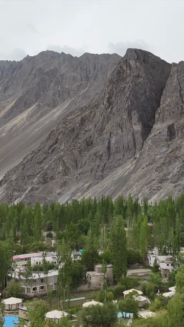 Vertical Aerial View of Leh City Surrounded by Himalayan Mountains in Ladakh India