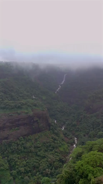 Vertical Aerial View of Lonavala Waterfall and Misty Green Hills During Monsoon Maharashtra