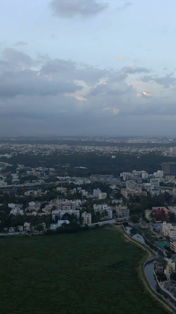 Vertical Aerial View of Madiwala Lake and Bangalore Cityscape India