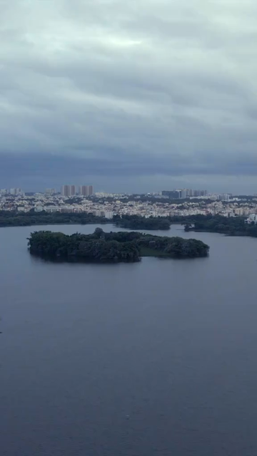 Vertical Aerial View of Madiwala Lake and Bangalore Cityscape India