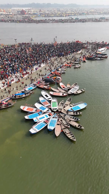 Vertical Aerial View of Pilgrims Gathering at Maha Kumbh Mela in Prayagraj India
