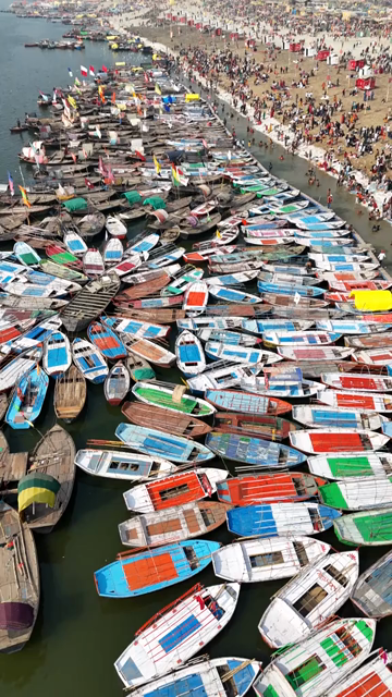 Vertical Aerial View of Pilgrims Gathering at Maha Kumbh Mela in Prayagraj India