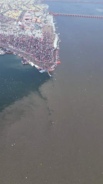 Vertical Aerial View of Pilgrims Gathering at Maha Kumbh Mela in Prayagraj India