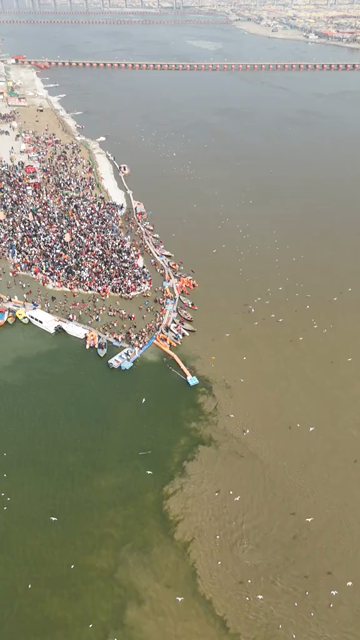 Vertical Aerial View of Pilgrims Gathering at Maha Kumbh Mela in Prayagraj India