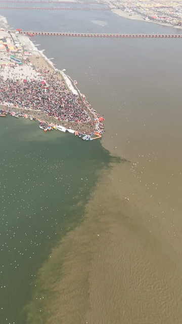 Vertical Aerial View of Pilgrims Gathering at Maha Kumbh Mela in Prayagraj India
