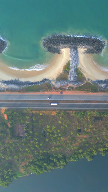 Vertical Aerial View of Maravanthe Beach Highway Between Sea and River Karnataka India