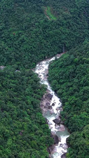 Vertical Aerial View of Mawryngkhang Bamboo Trek and Mountain Cliffs Meghalaya India