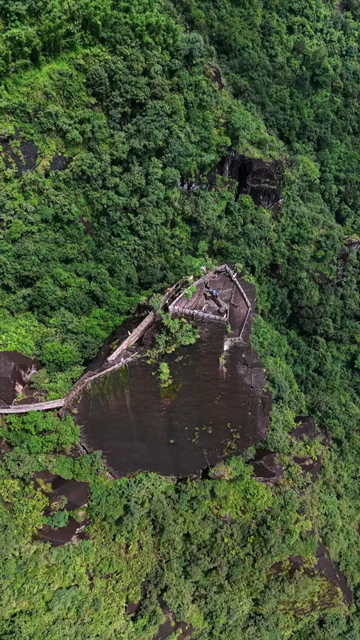Vertical Aerial View of Mawryngkhang Bamboo Trek and Mountain Cliffs Meghalaya India