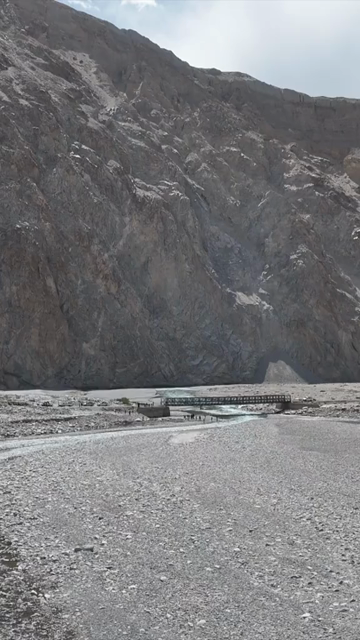 Vertical Aerial View of Mountain River and Rugged Himalayan Landscape in Ladakh India