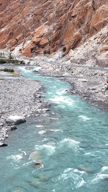 Vertical Aerial View of Mountain River and Rugged Himalayan Landscape in Ladakh India