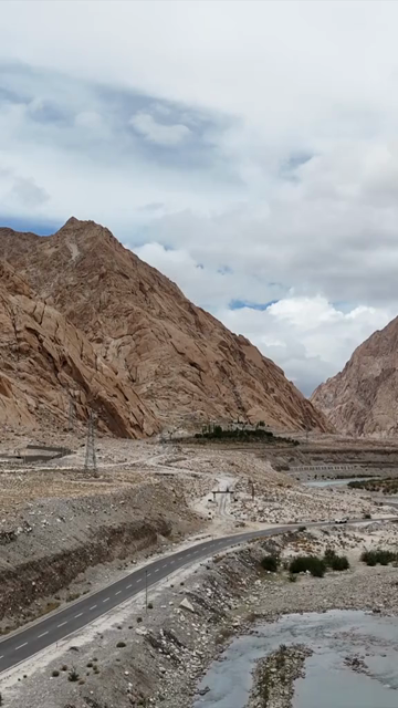 Vertical Aerial View of Mountain River and Rugged Himalayan Landscape in Ladakh India