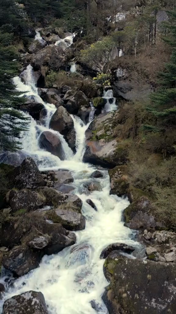 Vertical Aerial View of Mountain Waterfall in Tawang