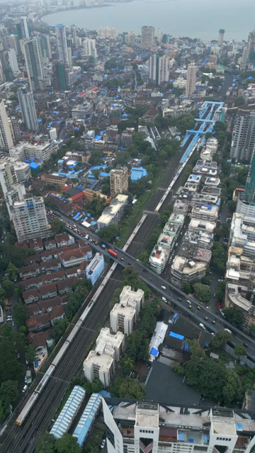 Vertical Aerial View of Mumbai Cityscape and Dense Urban Skyline Maharashtra