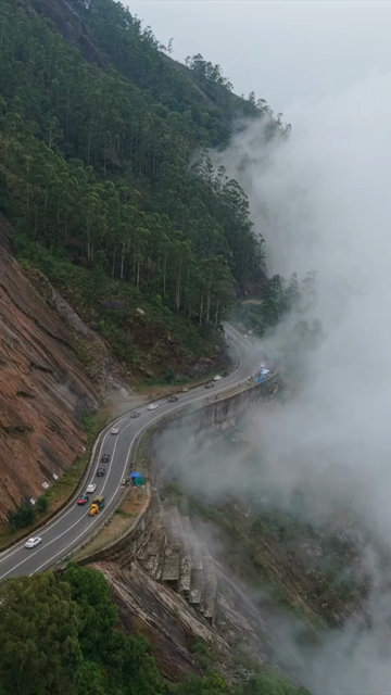 Vertical Aerial View of Scenic Mountain Roads and Tea Plantations in Munnar Kerala India