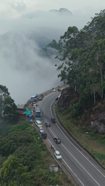 Vertical Aerial View of Scenic Mountain Roads and Tea Plantations in Munnar Kerala India