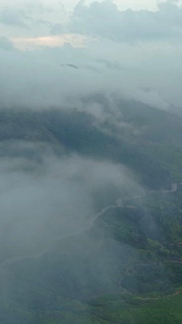 Vertical Aerial View of Scenic Mountain Roads and Tea Plantations in Munnar Kerala India