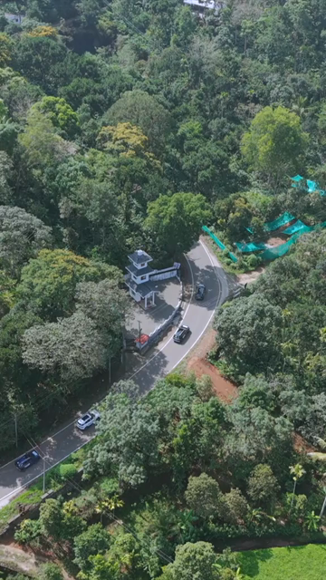 Vertical Aerial View of Scenic Mountain Roads and Tea Plantations in Munnar Kerala India