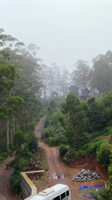 Vertical Aerial View of Scenic Mountain Roads and Tea Plantations in Munnar Kerala India