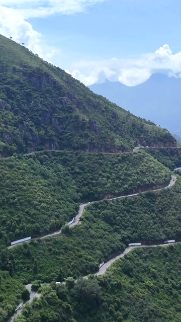Vertical Aerial View of Scenic Mountain Roads and Tea Plantations in Munnar Kerala India