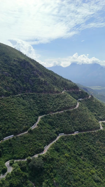 Vertical Aerial View of Scenic Mountain Roads and Tea Plantations in Munnar Kerala India