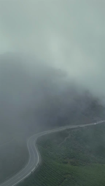 Vertical Aerial View of Scenic Mountain Roads and Tea Plantations in Munnar Kerala India