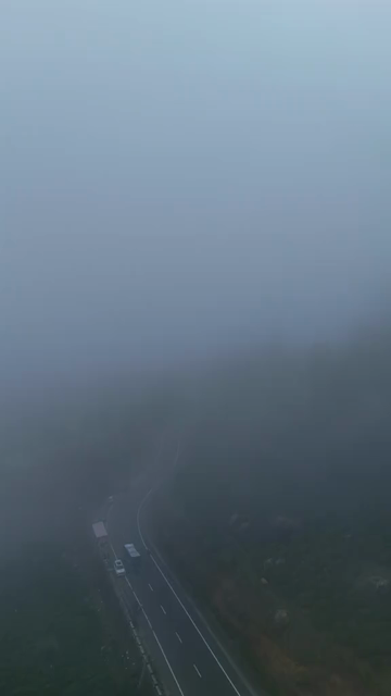 Vertical Aerial View of Scenic Mountain Roads and Tea Plantations in Munnar Kerala India