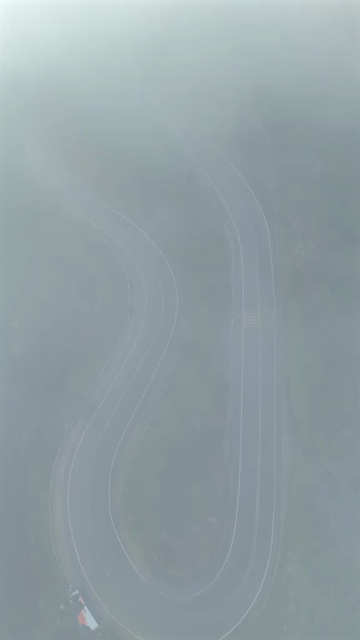 Vertical Aerial View of Scenic Mountain Roads and Tea Plantations in Munnar Kerala India