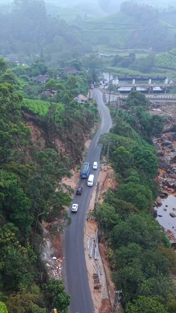 Vertical Aerial View of Scenic Mountain Roads and Tea Plantations in Munnar Kerala India