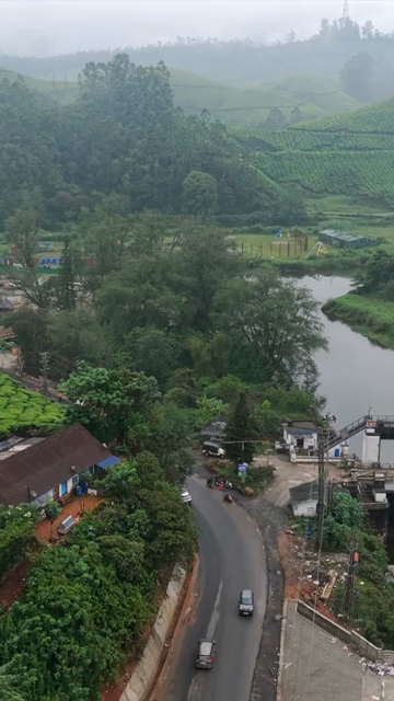 Vertical Aerial View of Scenic Mountain Roads and Tea Plantations in Munnar Kerala India