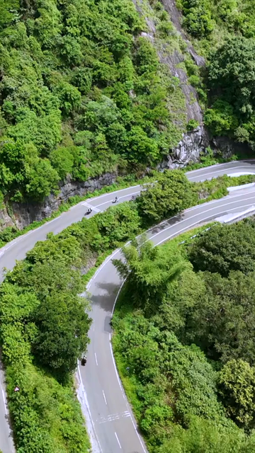 Vertical Aerial View of Scenic Mountain Roads and Tea Plantations in Munnar Kerala India