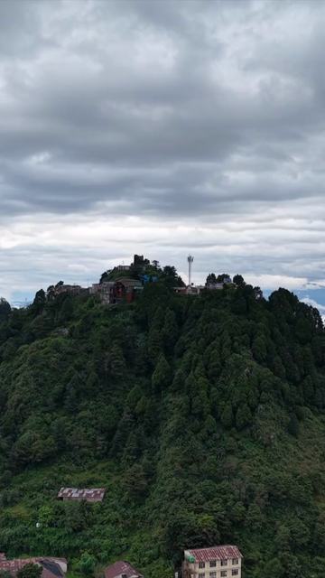 Vertical Aerial View of Mussoorie Amid Monsoon Clouds, Uttarakhand, India