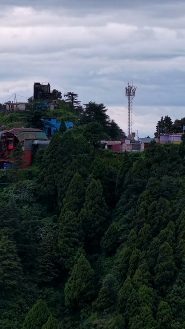 Vertical Aerial View of Mussoorie Amid Monsoon Clouds, Uttarakhand, India