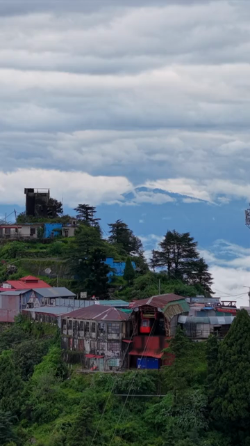 Vertical Aerial View of Mussoorie Amid Monsoon Clouds, Uttarakhand, India