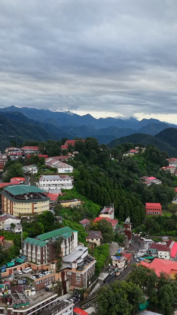 Vertical Aerial View of Mussoorie Amid Monsoon Clouds, Uttarakhand, India