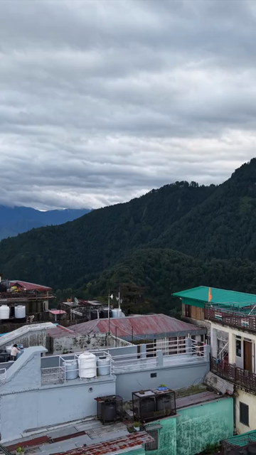 Vertical Aerial View of Mussoorie Amid Monsoon Clouds, Uttarakhand, India