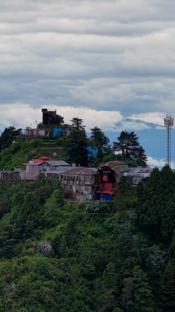 Vertical Aerial View of Mussoorie Amid Monsoon Clouds, Uttarakhand, India